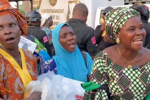 Women pray for Tinubu's 2027 re-election after receiving food from his son